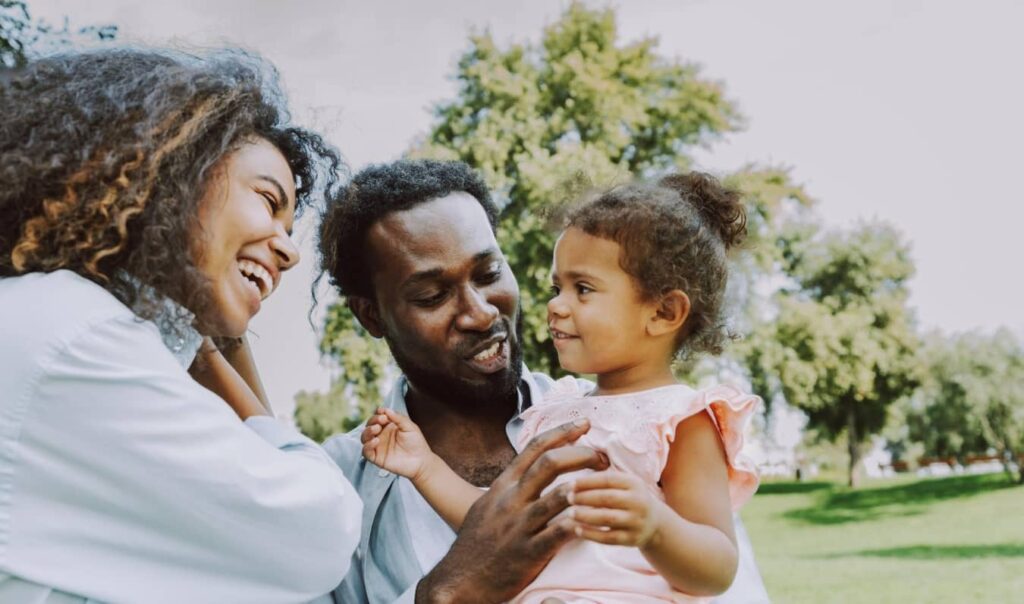 A happy family, father, mother and daughter